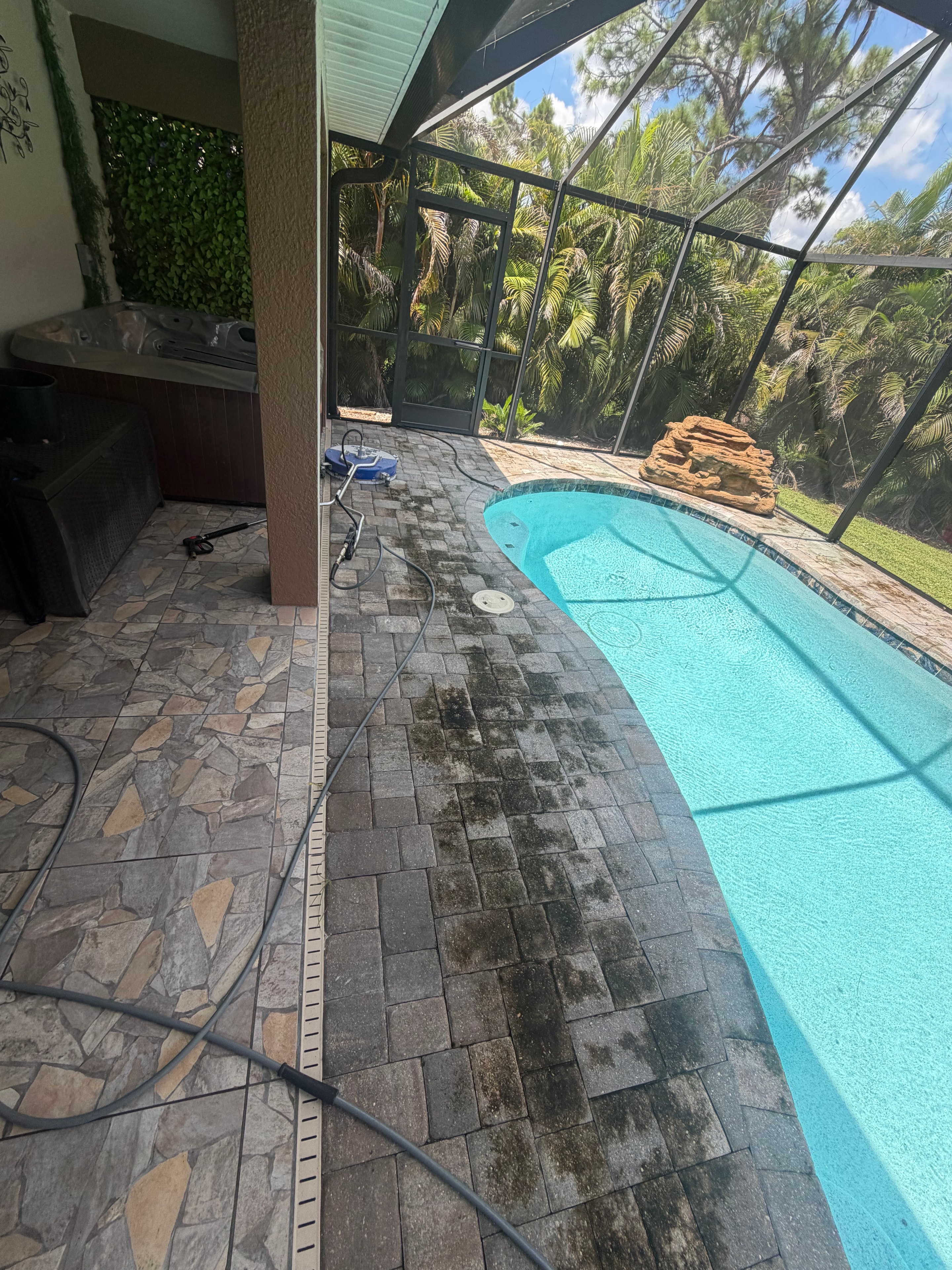 Dirty patio pavers before cleaning